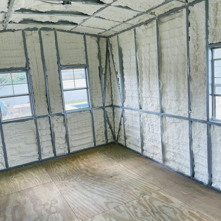 Closed-cell spray foam insulation applied to wall cavities in a residential project in Youngstown